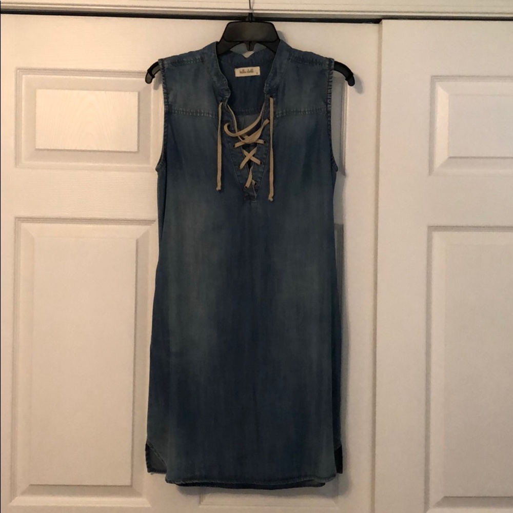 Sleeveless denim dress with string tied neckline